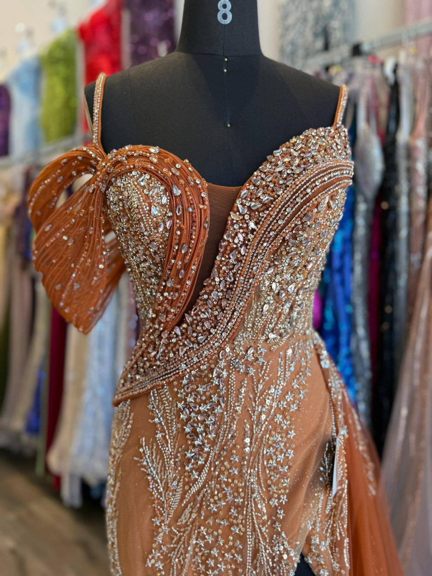 Off- shoulder neckline, embellished ombre motif, tulle overs